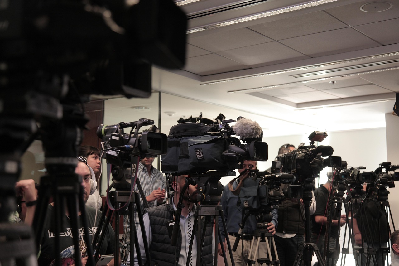 Penta Media reporters and cameras in a newsroom